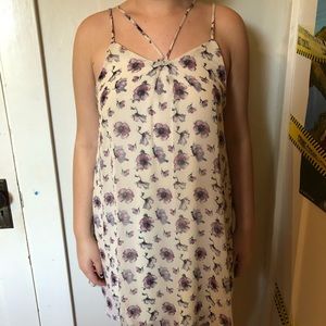 White dress w/ purple floral design & cross straps